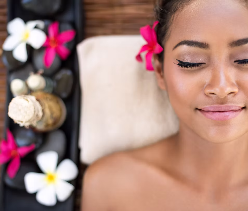 Client resting during a facial skincare appointment.